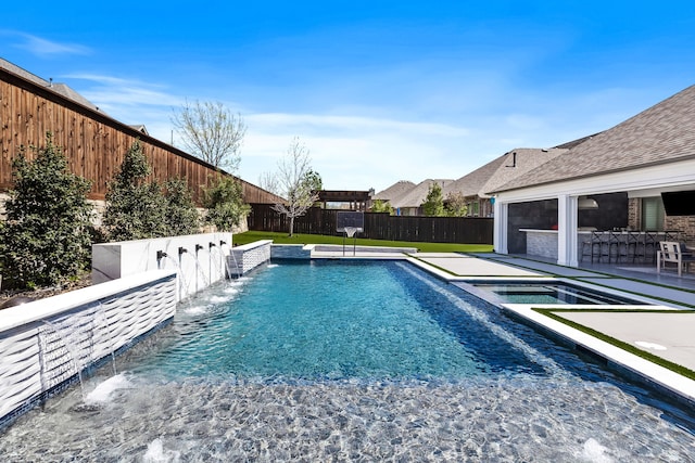 view of swimming pool with a fenced backyard, a fenced in pool, and a patio area