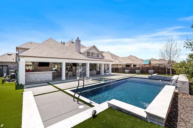 view of swimming pool featuring a patio, a fenced backyard, a fenced in pool, and a hot tub