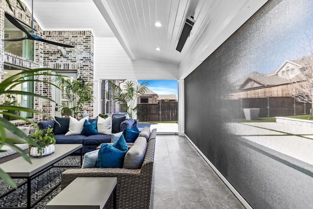 interior space with an outdoor living space and a patio