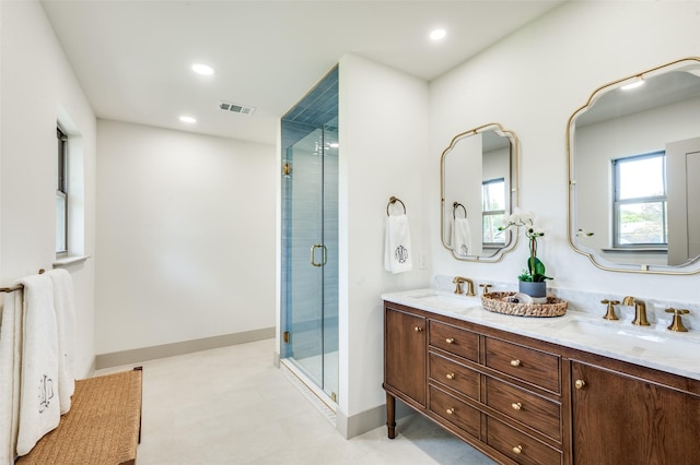 4209 Westmont Ct, Fort Worth, TX 76109 - full bathroom featuring double vanity, a shower stall, baseboards, and recessed lighting