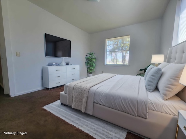 3205 Parkside Dr, Mesquite, TX 75150 - bedroom with carpet flooring, baseboards, and vaulted ceiling