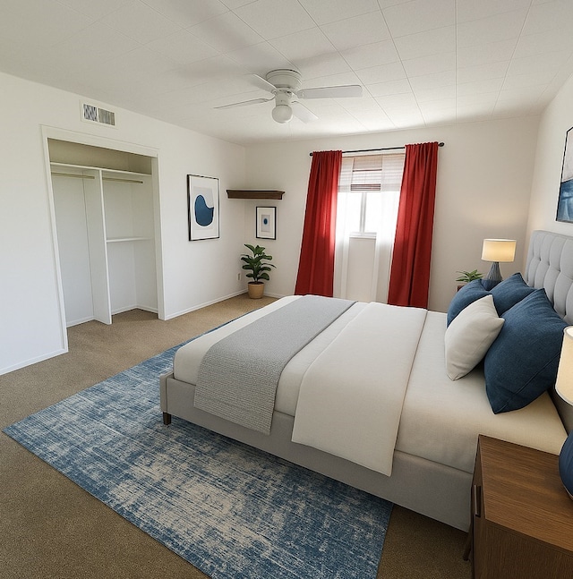 3205 Parkside Dr, Mesquite, TX 75150 - bedroom with carpet floors, a ceiling fan, a closet, and baseboards