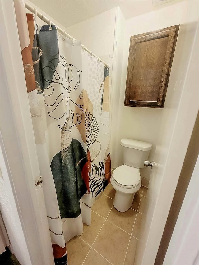3205 Parkside Dr, Mesquite, TX 75150 - bathroom featuring tile patterned flooring and toilet