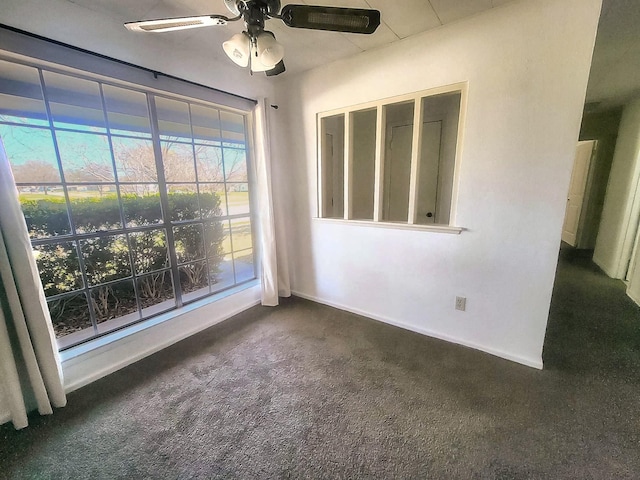 3205 Parkside Dr, Mesquite, TX 75150 - unfurnished room with ceiling fan, dark carpet, and baseboards