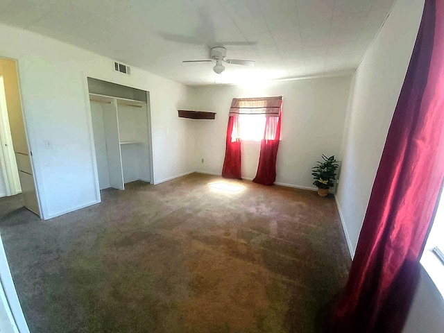 3205 Parkside Dr, Mesquite, TX 75150 - unfurnished bedroom featuring carpet floors, ceiling fan, and a closet