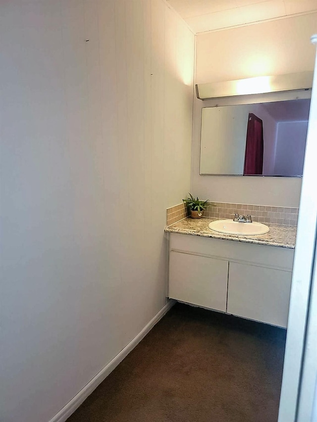 3205 Parkside Dr, Mesquite, TX 75150 - bathroom with vanity and tasteful backsplash