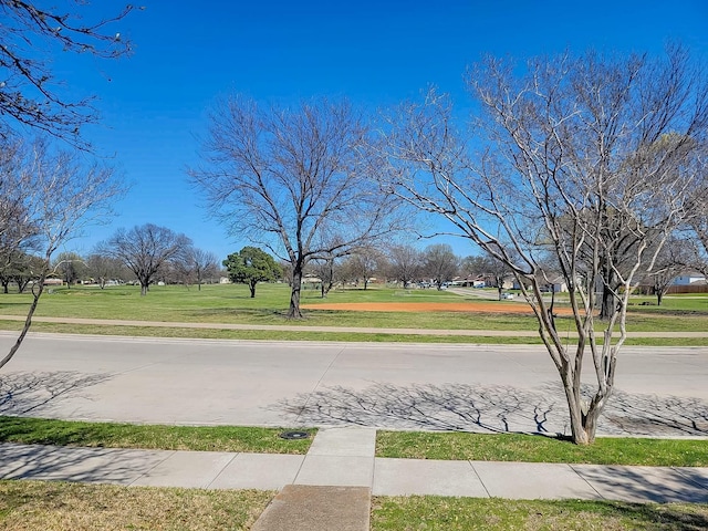 3205 Parkside Dr, Mesquite, TX 75150 - view of concrete road with sidewalks