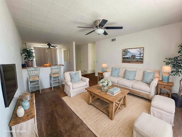 3205 Parkside Dr, Mesquite, TX 75150 - living room featuring a ceiling fan and wood finished floors