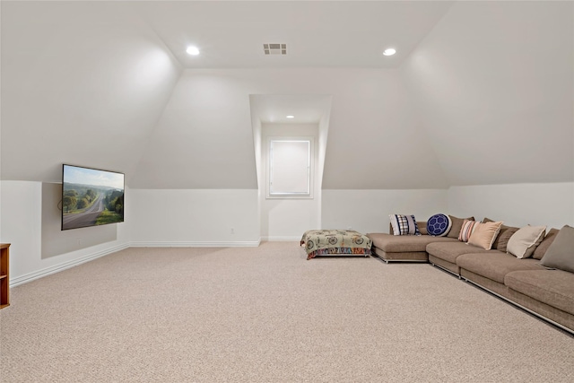 living room with carpet, visible vents, baseboards, and vaulted ceiling