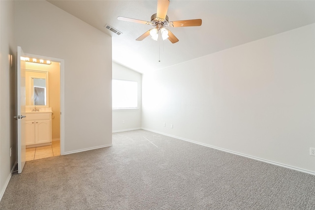 6228 Adonia Dr, Fort Worth, TX 76131 - unfurnished bedroom with connected bathroom, light colored carpet, vaulted ceiling, visible vents, and baseboards