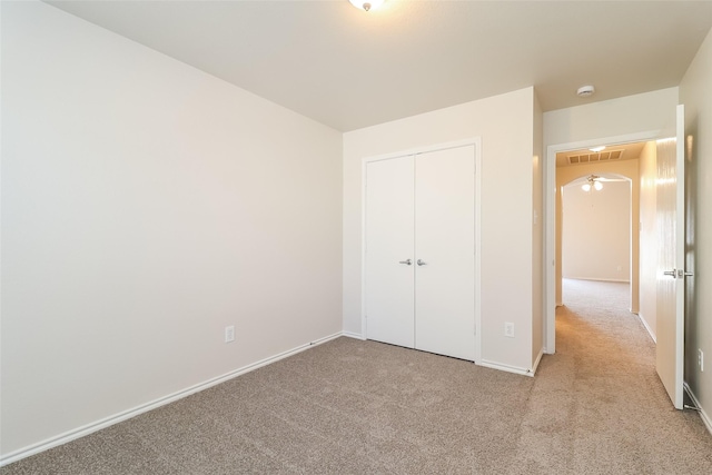 6228 Adonia Dr, Fort Worth, TX 76131 - unfurnished bedroom with a closet, visible vents, light colored carpet, and baseboards