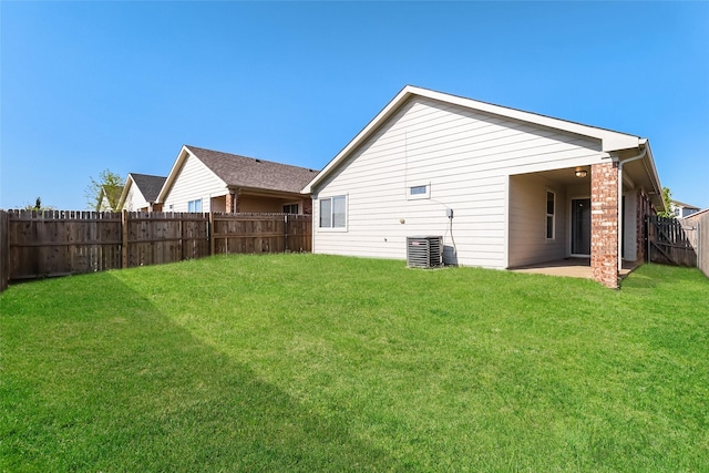 6228 Adonia Dr, Fort Worth, TX 76131 - back of house featuring cooling unit, a patio, a yard, and a fenced backyard