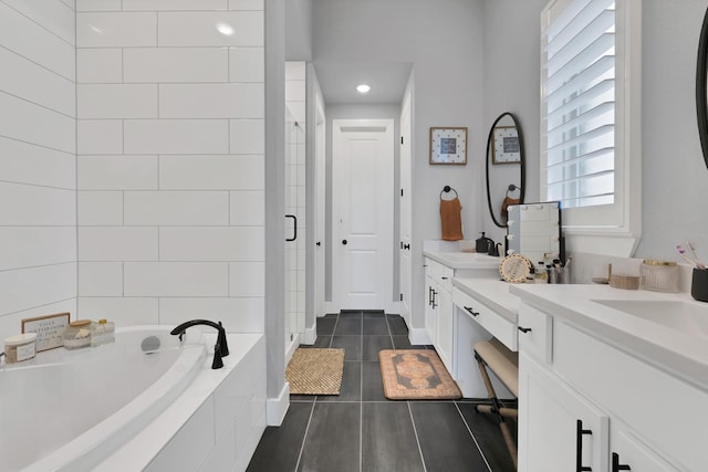 1920 Barnhill Ln, Van Alstyne, TX 75495 - full bathroom with vanity, a shower stall, a garden tub, and tile patterned flooring