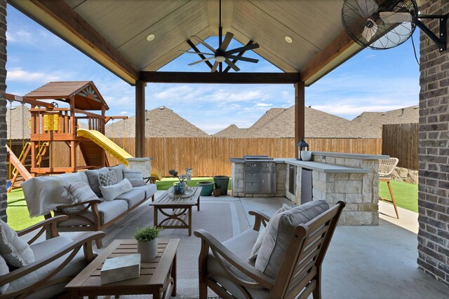 1920 Barnhill Ln, Van Alstyne, TX 75495 - fenced backyard with a gazebo, outdoor lounge area, a patio, a playground, and ceiling fan