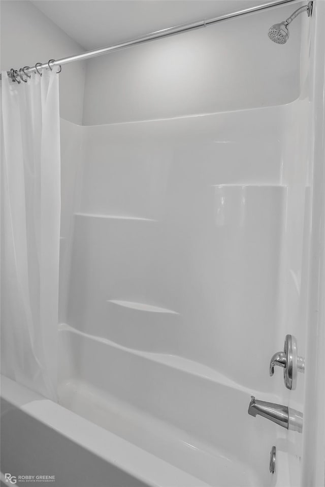 full bathroom with shower / bathtub combination with curtain