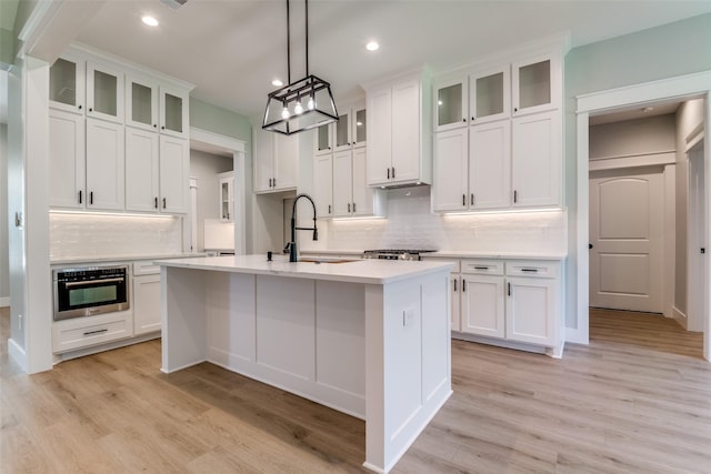 3822 Evergreen Ln, Caddo Mills, TX 75135 - kitchen featuring a sink, oven, tasteful backsplash, white cabinetry, and recessed lighting