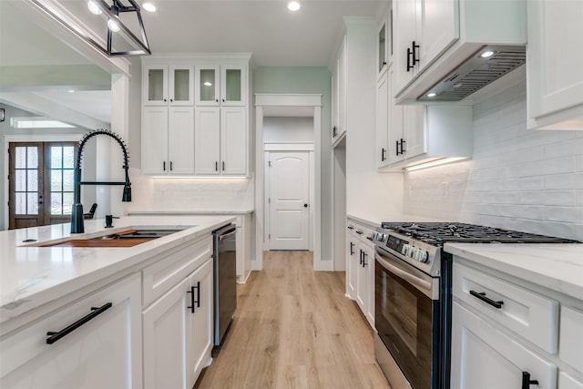 3822 Evergreen Ln, Caddo Mills, TX 75135 - kitchen with appliances with stainless steel finishes, a sink, white cabinetry, recessed lighting, and tasteful backsplash