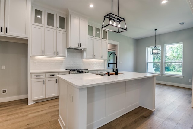 3822 Evergreen Ln, Caddo Mills, TX 75135 - kitchen with a sink, backsplash, white cabinetry, and recessed lighting