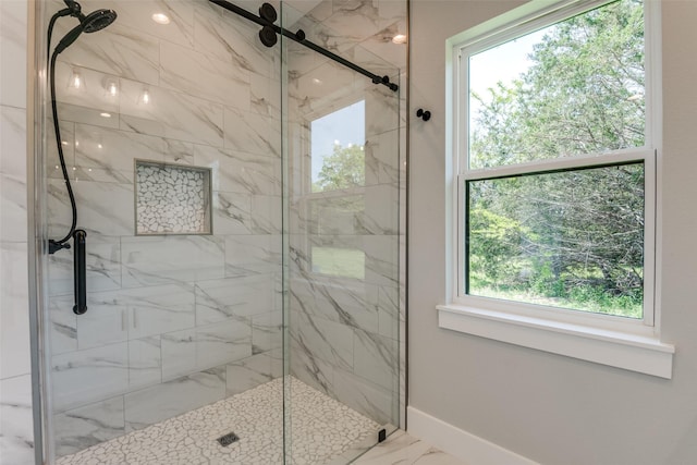 3822 Evergreen Ln, Caddo Mills, TX 75135 - full bathroom with a marble finish shower, marble look tile flooring, and baseboards