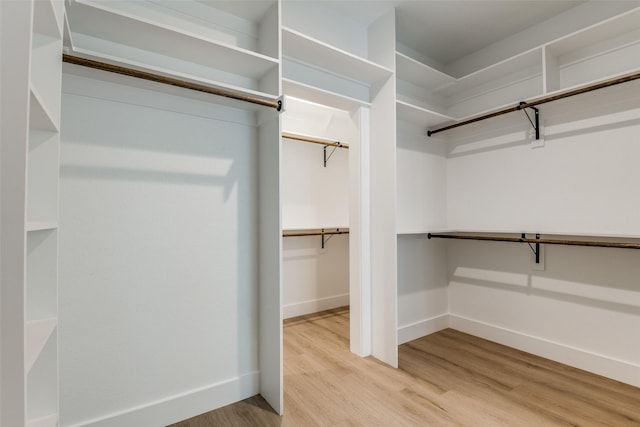 3822 Evergreen Ln, Caddo Mills, TX 75135 - spacious closet with wood finished floors