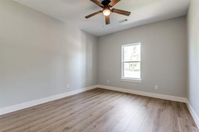 3822 Evergreen Ln, Caddo Mills, TX 75135 - unfurnished room featuring baseboards, light wood-style flooring, and a ceiling fan