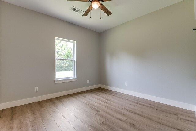 3822 Evergreen Ln, Caddo Mills, TX 75135 - empty room with baseboards, wood finished floors, and a ceiling fan