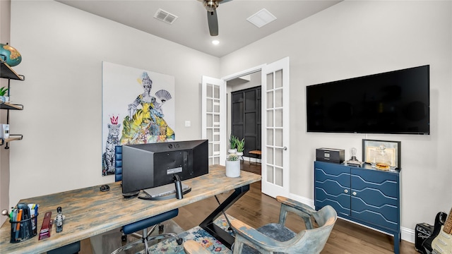 office with ceiling fan, french doors, baseboards, wood finished floors, and visible vents