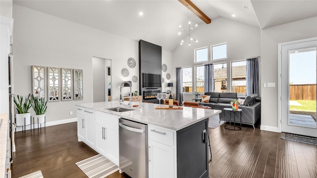 kitchen featuring stainless steel dishwasher, dark wood-style flooring, beam ceiling, high vaulted ceiling, and a sink
