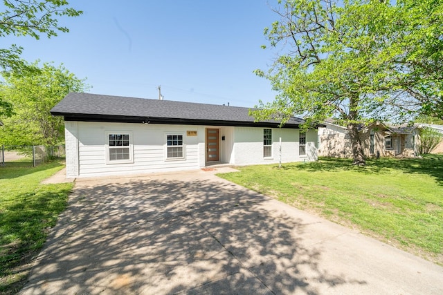 419 Candlelight Ave, Duncanville, TX 75137 - mid-century inspired home with driveway, brick siding, and roof with shingles