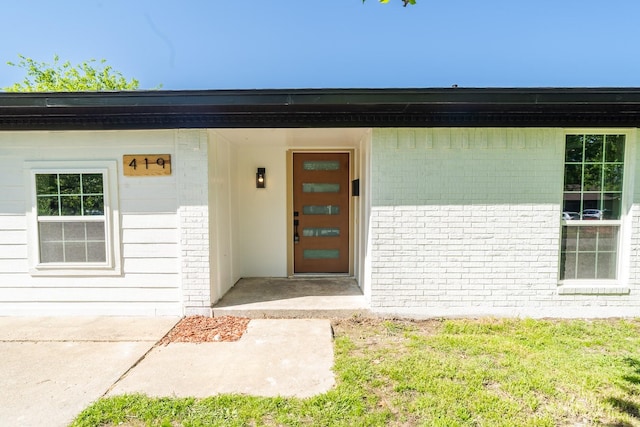 419 Candlelight Ave, Duncanville, TX 75137 - property entrance featuring brick siding