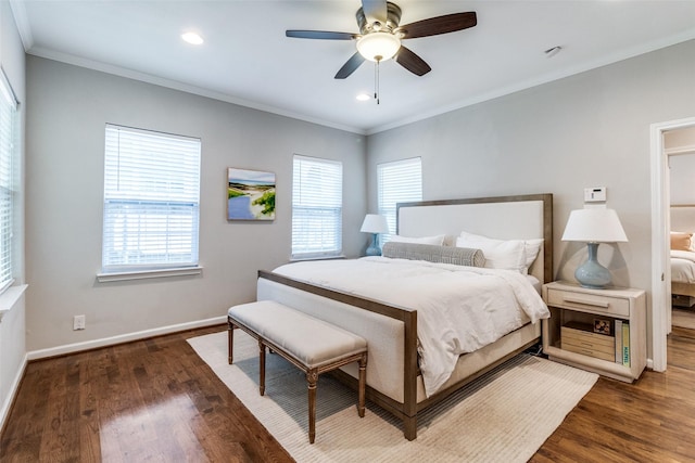 bedroom with crown molding, baseboards, dark wood-style floors, and recessed lighting
