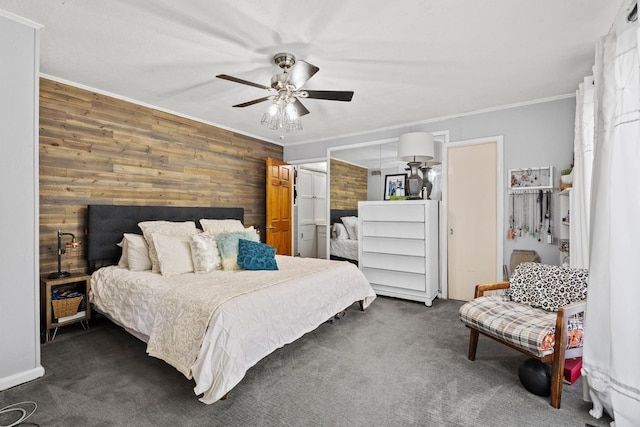 336 Kirk Ave, Pottsboro, TX 75076 - bedroom with a ceiling fan, wood walls, crown molding, and dark colored carpet