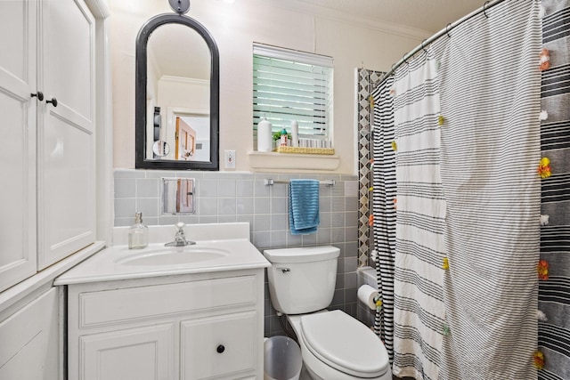 336 Kirk Ave, Pottsboro, TX 75076 - bathroom with toilet, vanity, ornamental molding, tile walls, and a shower with shower curtain