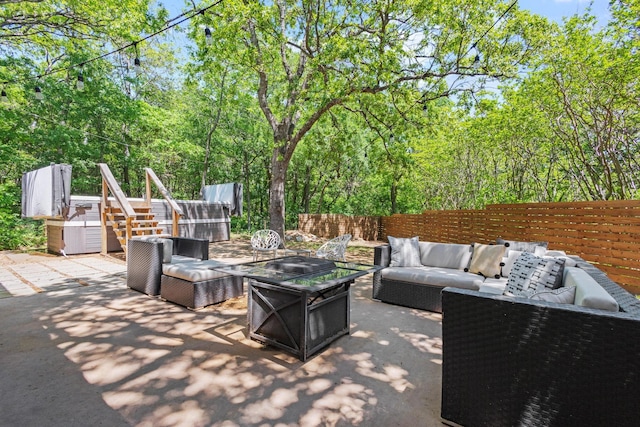 336 Kirk Ave, Pottsboro, TX 75076 - view of patio / terrace featuring fence and an outdoor living space with a fire pit