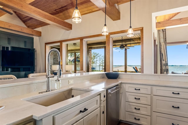 kitchen with wooden ceiling, lofted ceiling with beams, a sink, white cabinetry, and pendant lighting