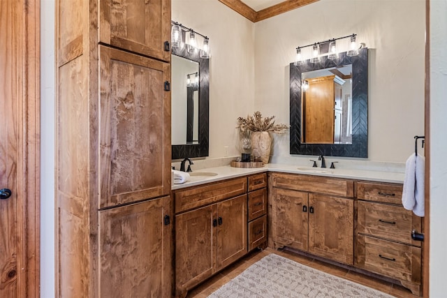 full bath with tile patterned flooring, double vanity, and a sink