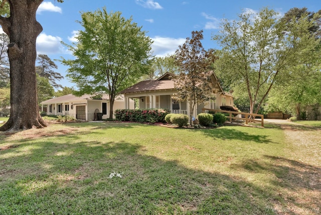 651 Delaware St, Shreveport, LA 71106 - view of yard with a garage