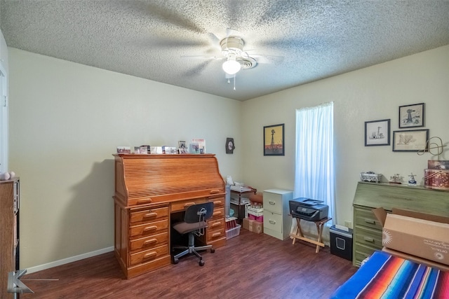 office space with ceiling fan, baseboards, wood finished floors, and a textured ceiling