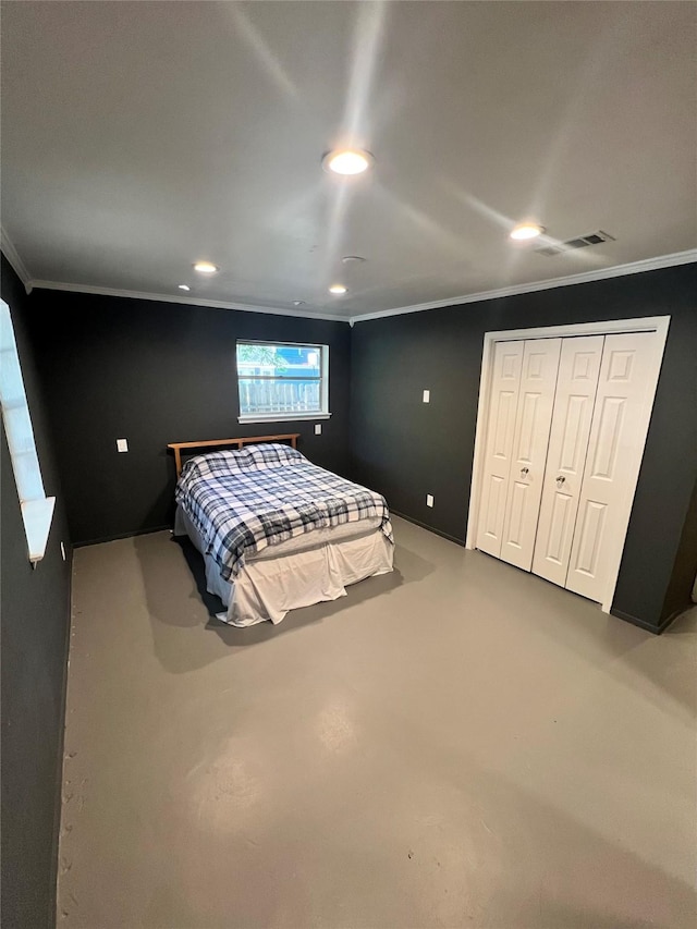 bedroom with concrete floors, crown molding, and recessed lighting