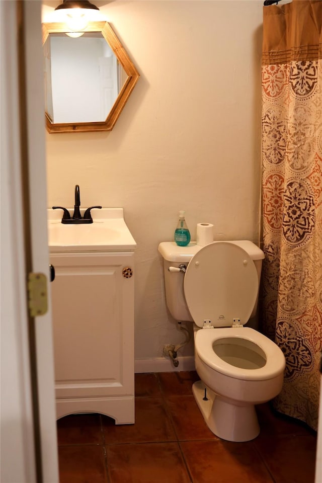 full bath featuring vanity, toilet, a shower with curtain, and tile patterned flooring