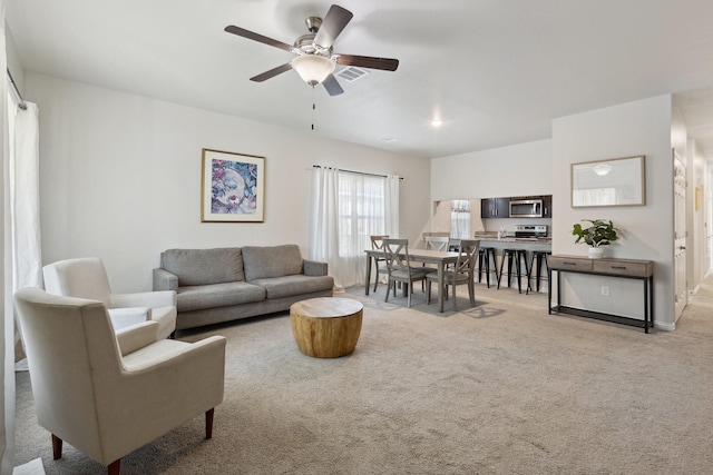 4538 Cherbourg St, Dallas, TX 75216 - living room with carpet floors and ceiling fan