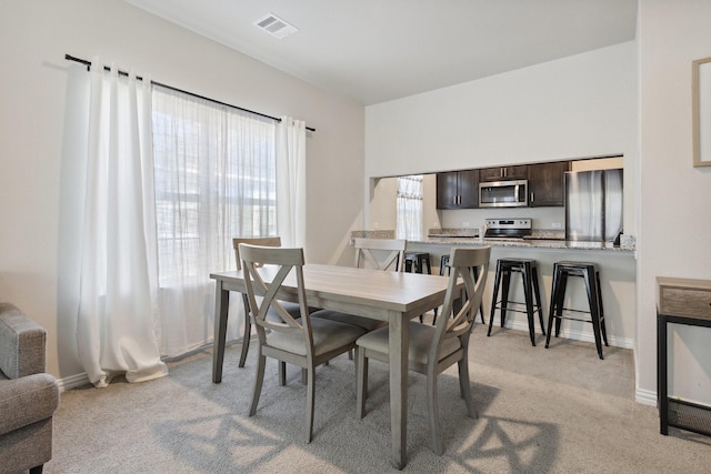 4538 Cherbourg St, Dallas, TX 75216 - dining space with light carpet and baseboards