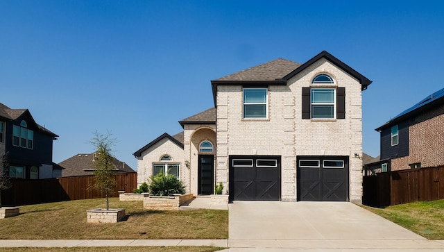 304 Winding Creek Ln, Anna, TX 75409 - traditional-style home with a garage, fence, concrete driveway, brick siding, and roof with shingles
