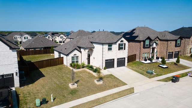 304 Winding Creek Ln, Anna, TX 75409 - view of front facade with a garage, fence, a front lawn, a residential view, and driveway