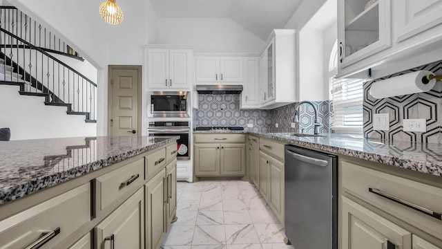 304 Winding Creek Ln, Anna, TX 75409 - kitchen with stainless steel appliances, tasteful backsplash, light stone countertops, and marble finish floor