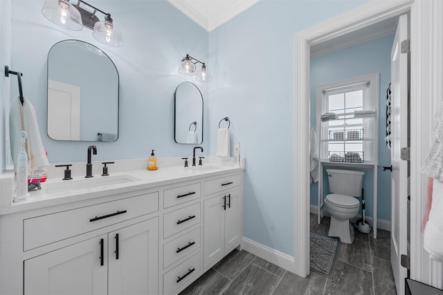 full bathroom featuring baseboards, crown molding, a sink, and double vanity