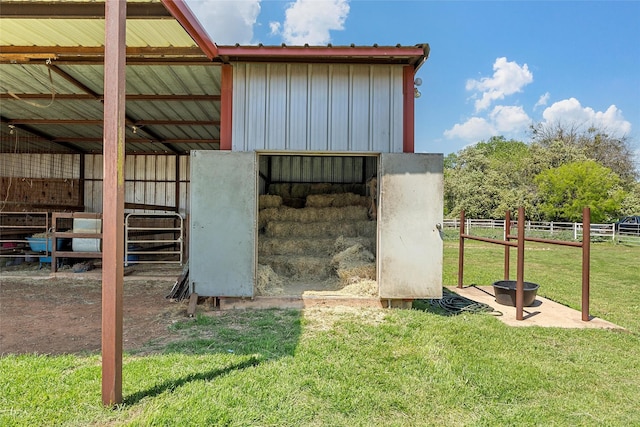 view of outdoor structure featuring an exterior structure and an outbuilding