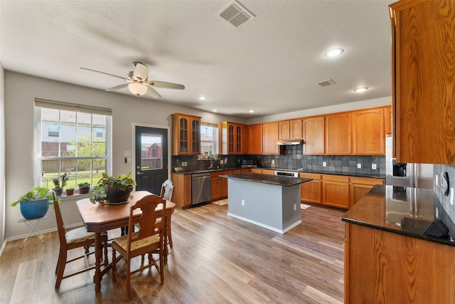 3101 Clear Springs Dr, Forney, TX 75126 - kitchen with tasteful backsplash, visible vents, dishwasher, and under cabinet range hood