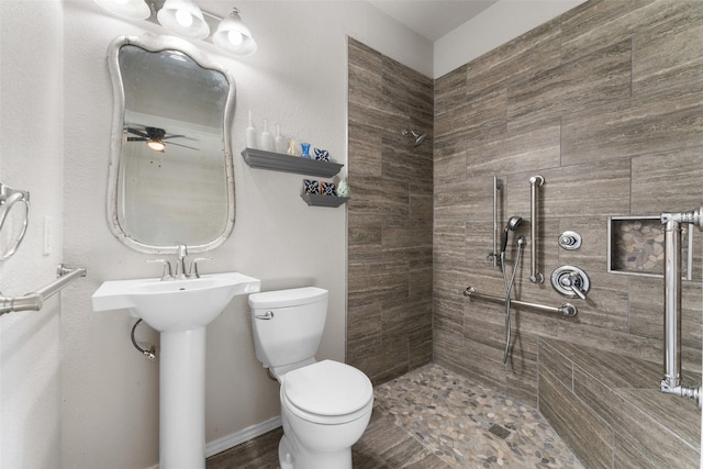 3101 Clear Springs Dr, Forney, TX 75126 - full bath featuring a tile shower, toilet, ceiling fan, and a sink