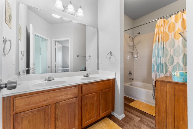 3101 Clear Springs Dr, Forney, TX 75126 - full bath with shower / bathtub combination with curtain, double vanity, a sink, and wood finished floors
